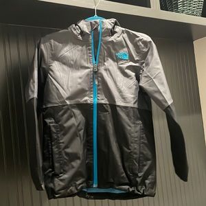 Boys Medium North Face Rain Jacket, black/grey with blue interior, excellent